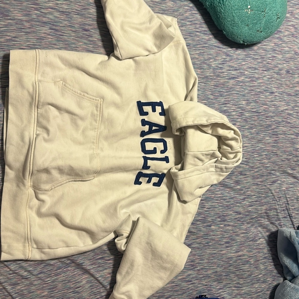 medium sweatshirt, like a small. no stains and off white.